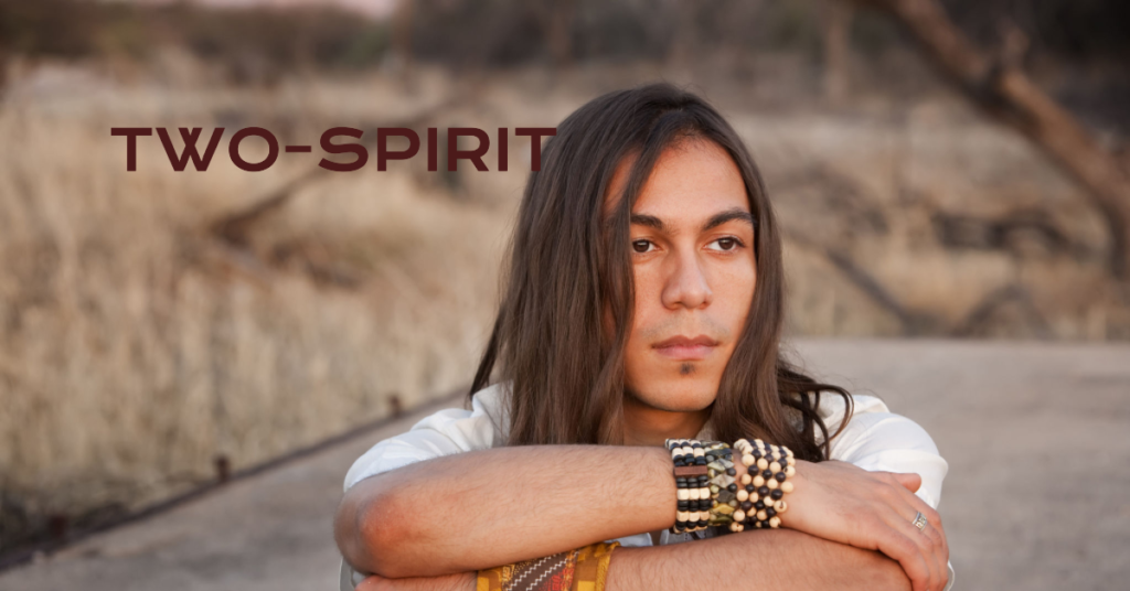 Młody mężczyzna-Two Spirit, reprezentujący różnorodność tożsamości LGBTQ. Artykuł eksploruje nieznane aspekty tożsamości, w tym termin Two-Spirit w społeczności rdzennej ludności Ameryki Północnej. Dwa Duchy: Nieznana Tożsamość. Two Spirit